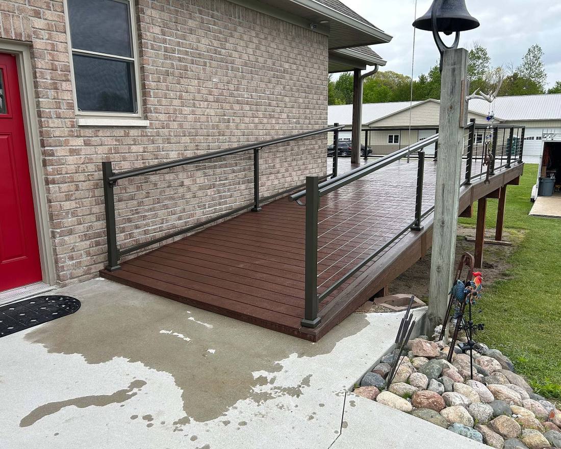 Accessibility ramp built onto a composite deck