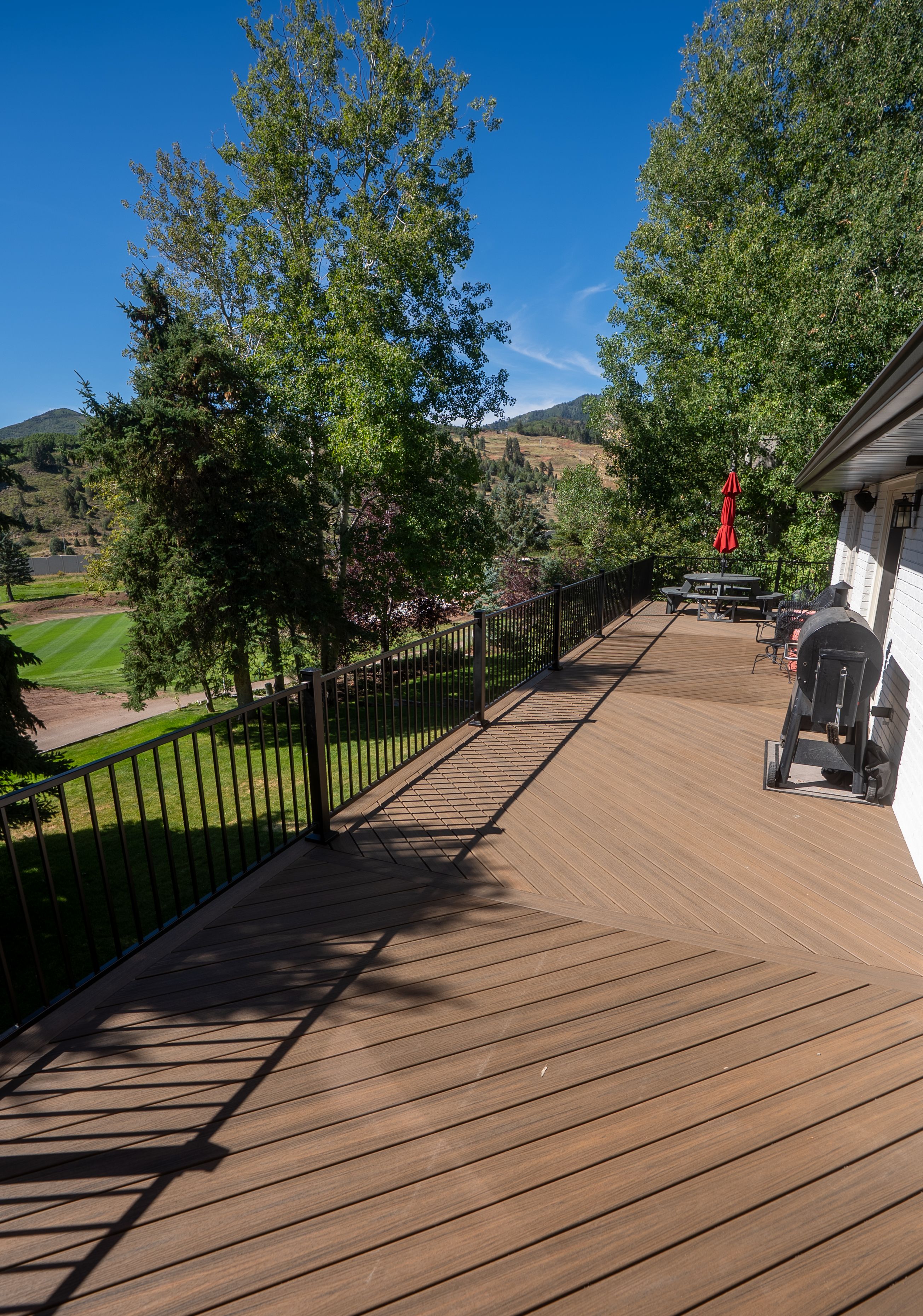 Composite deck boards laid in a pattern