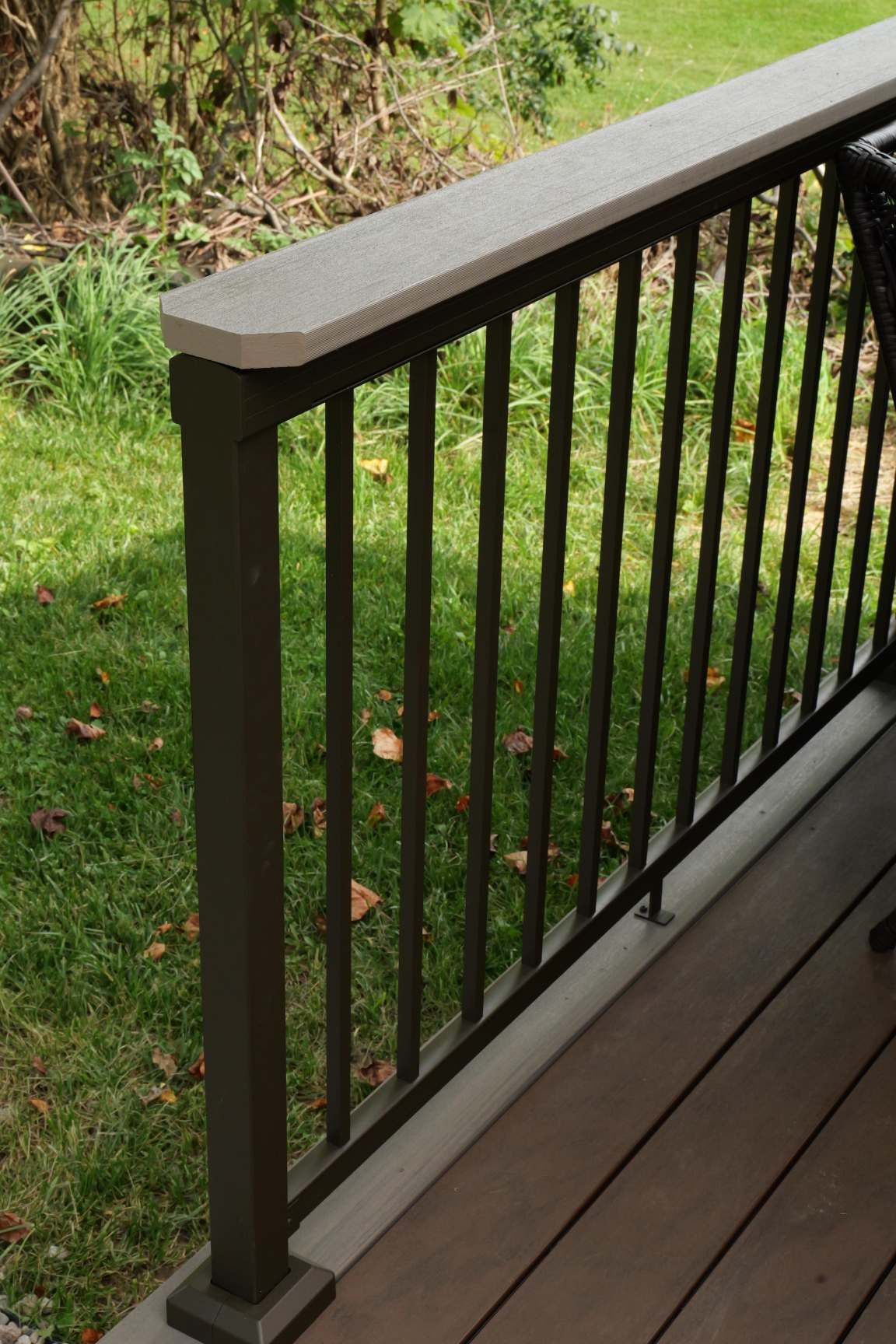 Composite drink rail on top of deck railing