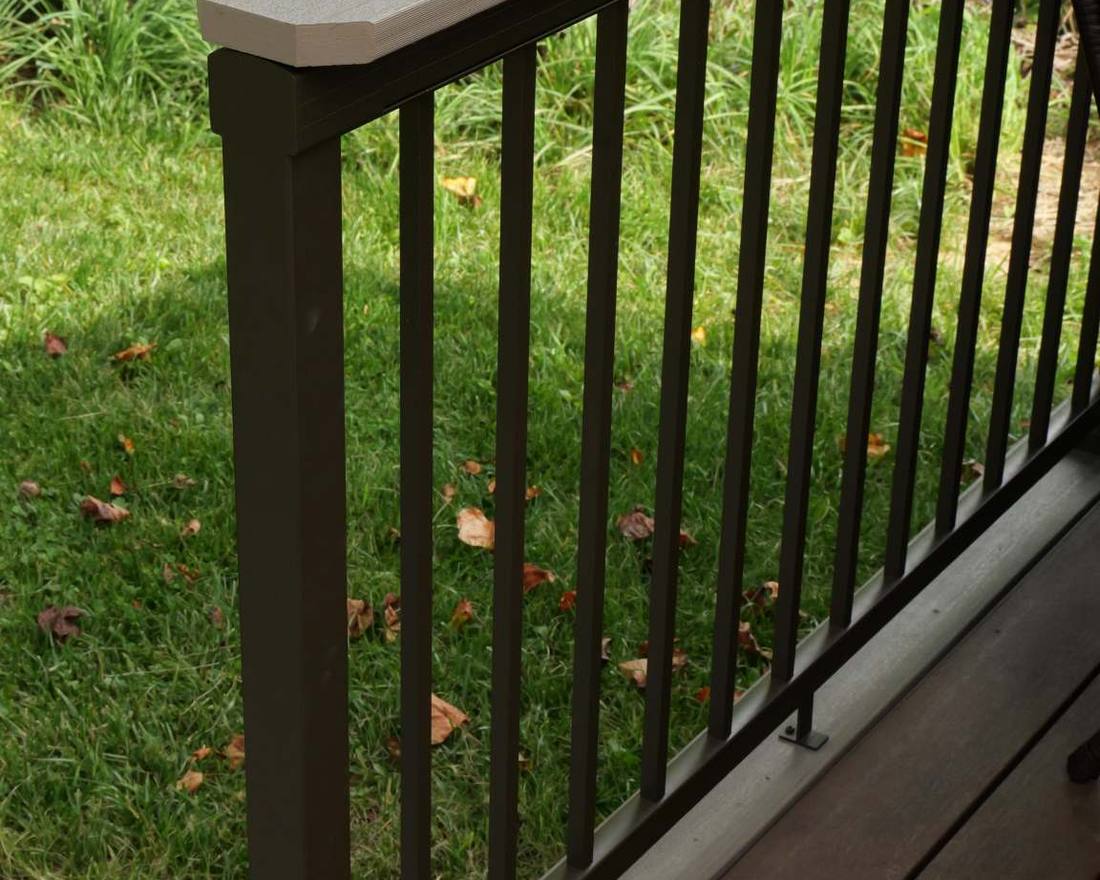 Composite drink rail on top of deck railing