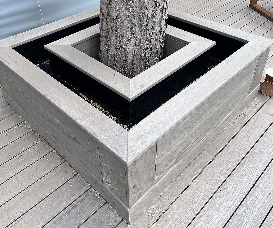 Composite planter built into a deck