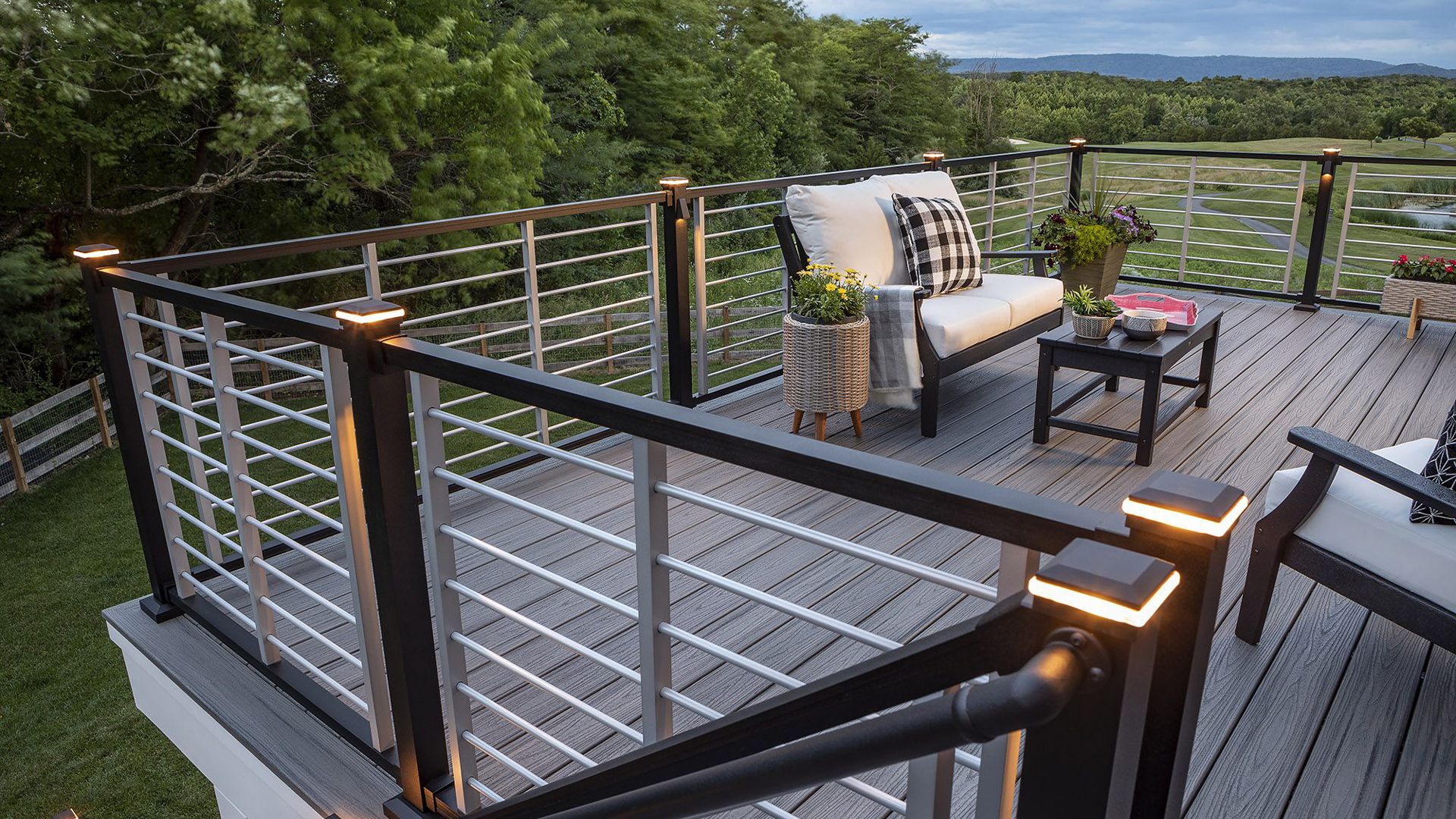 Deck railing with integrated lighting